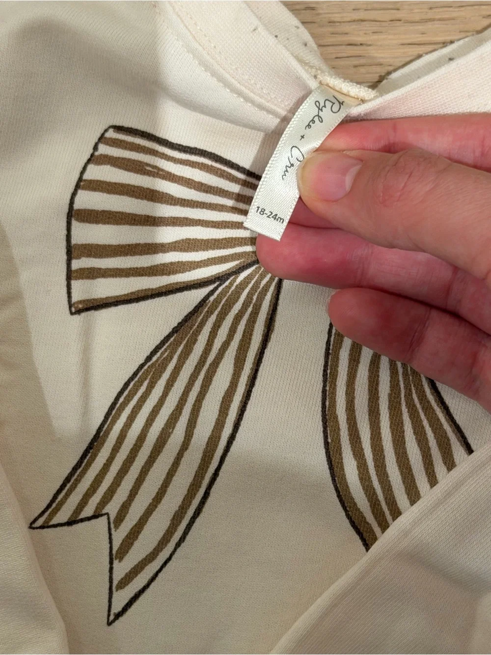 Rylee + Cru Cream sweatshirt with Brown Bow Graphic - Kids 18-24m